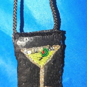 Cellphone holder over the shoulder